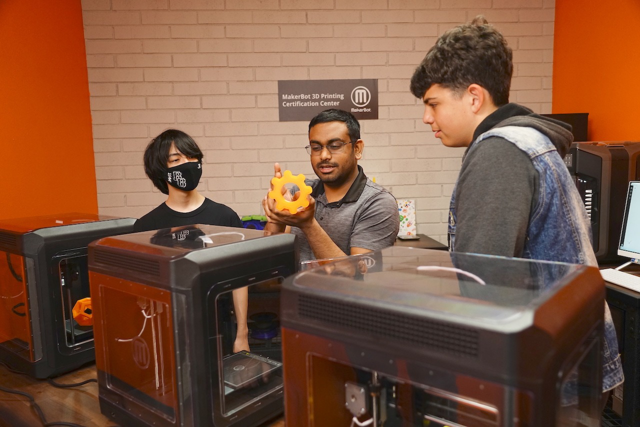 Students prototype parts to test on their robot.